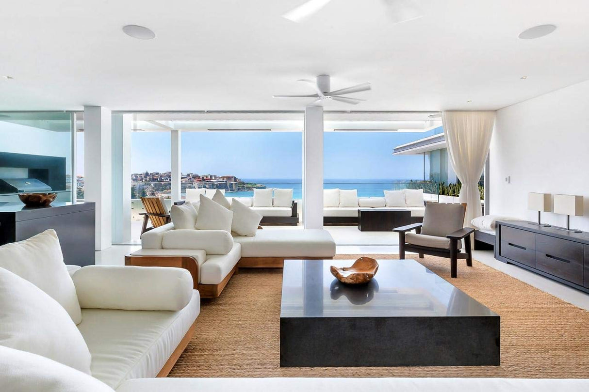 Matthews Fan IR5H-BRBR-MWH-42 Irene-5H five-blade flush mount paddle fan in Brushed Brass finish with 42” solid matte white wood blades.