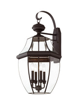 Livex Lighting 2356-02 Outdoor Wall Lantern with Clear Beveled Glass Shades, Polished Brass
