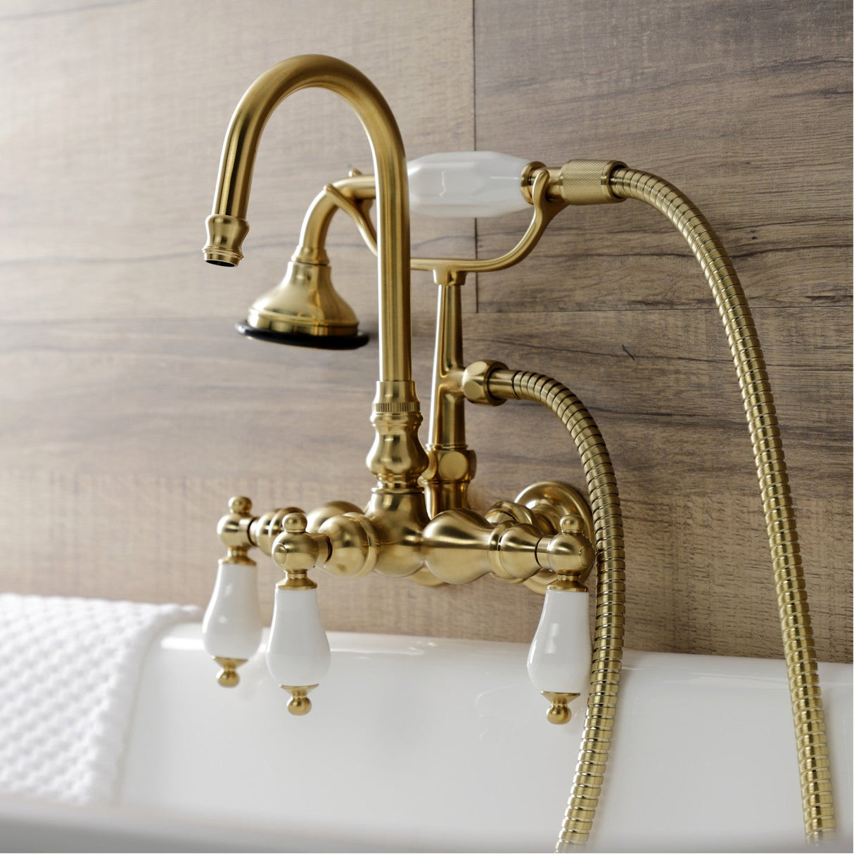 Aqua Vintage AE11T7 Three-Handle 2-Hole Tub Wall Mount Clawfoot Tub Faucet with Hand Shower, Brushed Brass