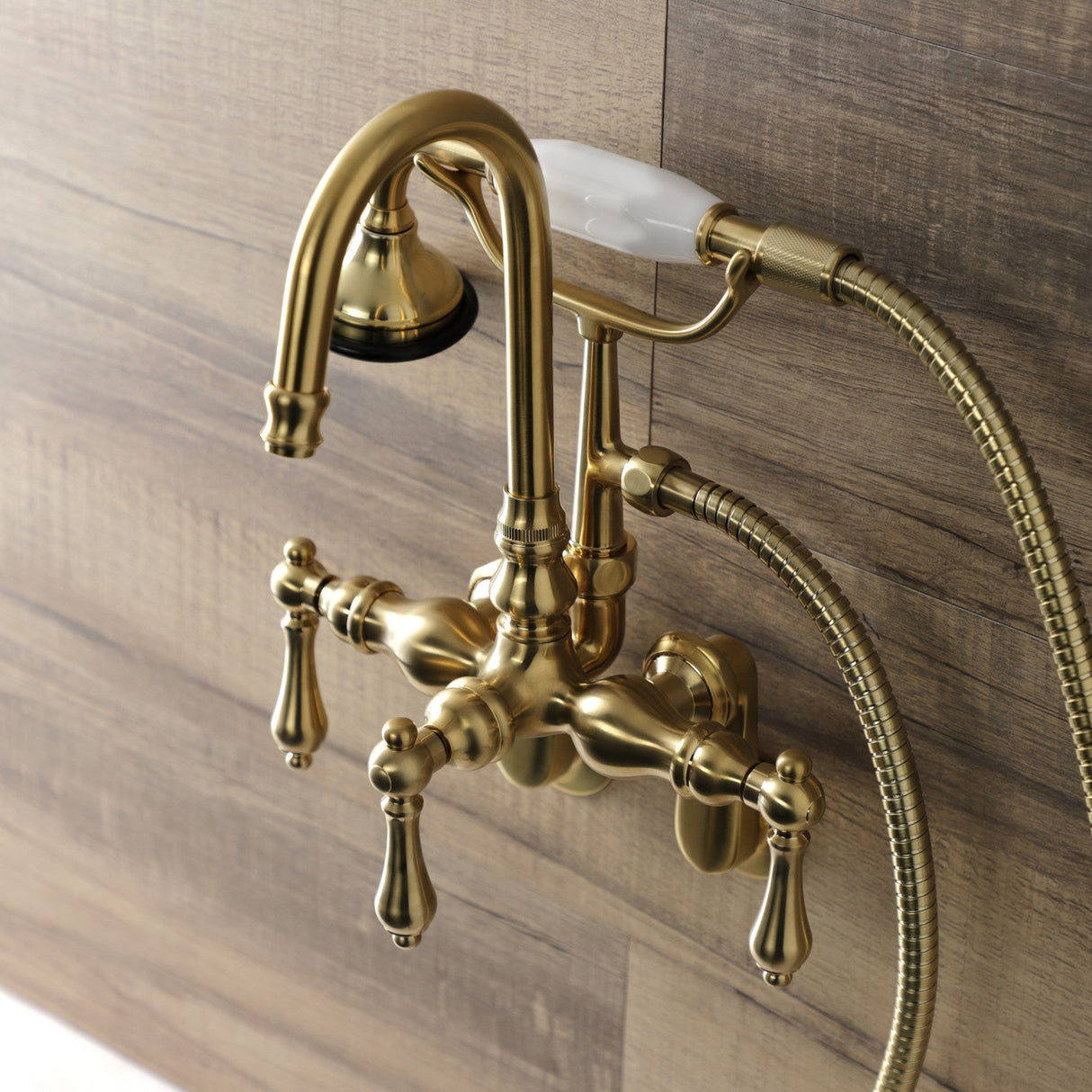 Aqua Vintage AE301T7 Three-Handle 2-Hole Tub Wall Mount Clawfoot Tub Faucet with Hand Shower, Brushed Brass
