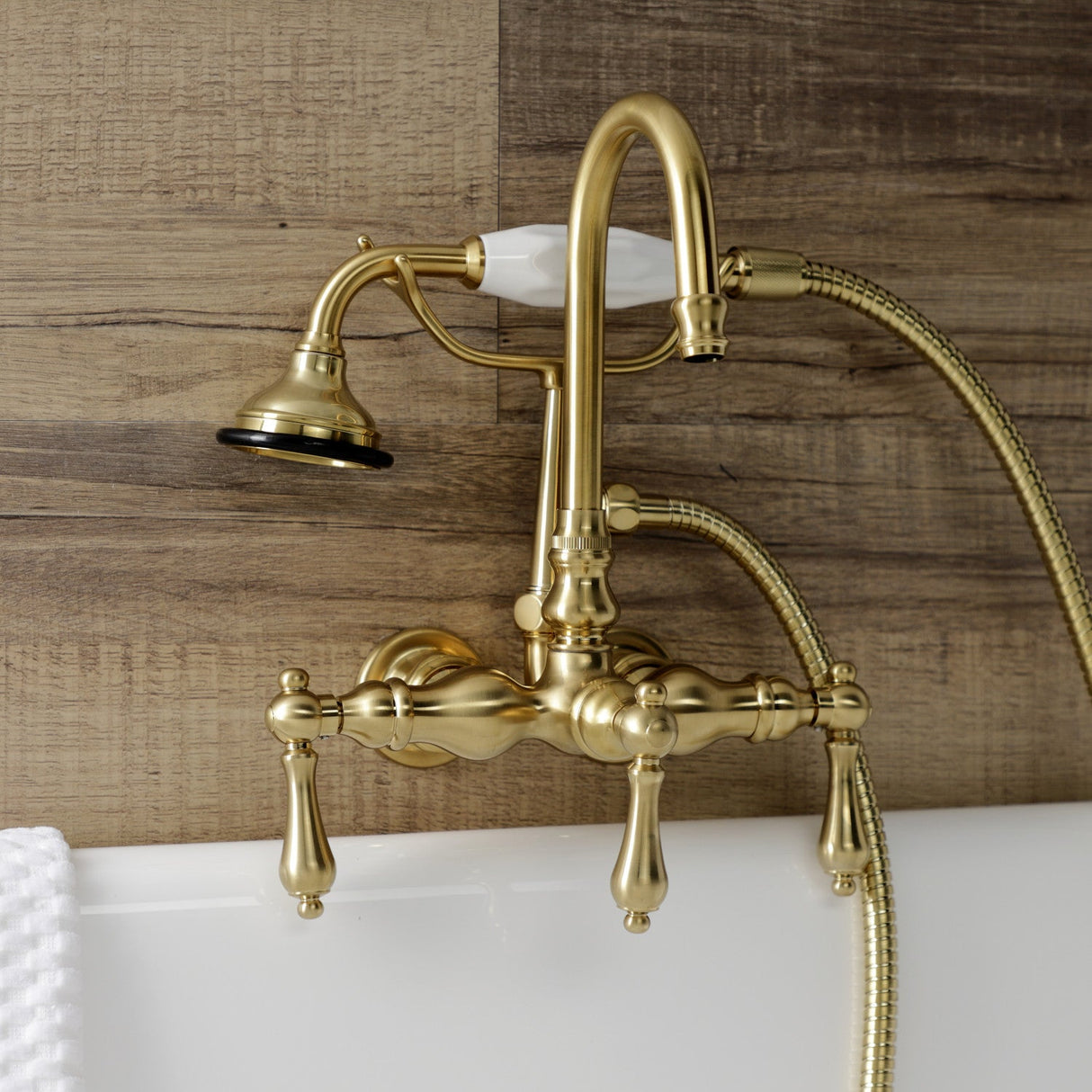 Aqua Vintage AE7T7 Three-Handle 2-Hole Tub Wall Mount Clawfoot Tub Faucet with Hand Shower, Brushed Brass