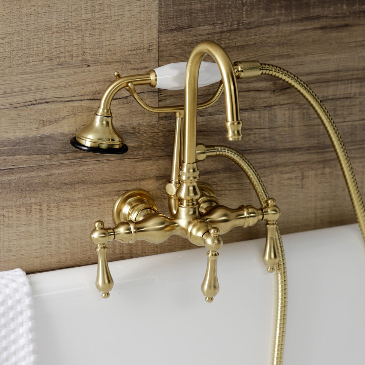 Aqua Vintage AE7T7 Three-Handle 2-Hole Tub Wall Mount Clawfoot Tub Faucet with Hand Shower, Brushed Brass