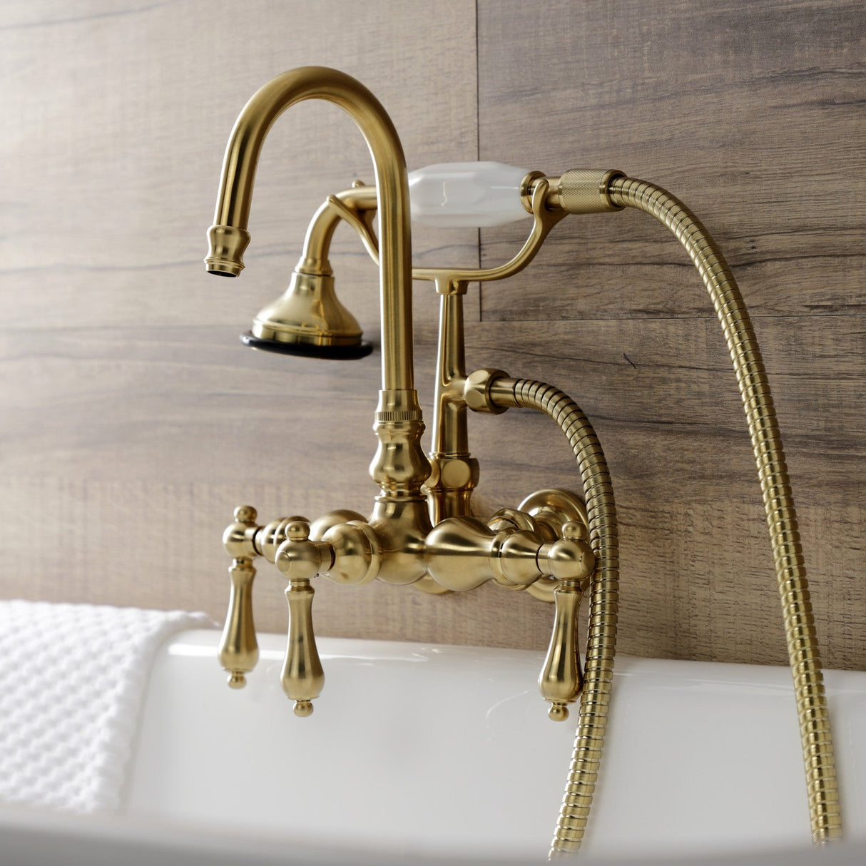 Aqua Vintage AE7T7 Three-Handle 2-Hole Tub Wall Mount Clawfoot Tub Faucet with Hand Shower, Brushed Brass