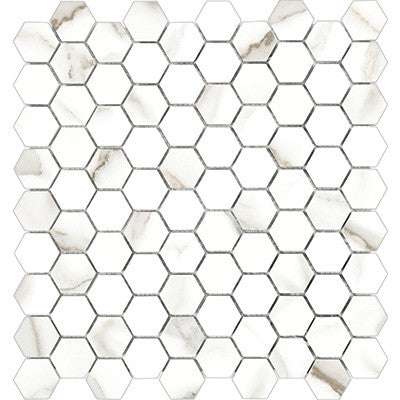 Anatolia Tile 1.25 Inch Mayfair Calacatta Polished Porcelain Hexagon Mosaics. 1 Sheet = .97 Sq. Ft. 4501-0146-1 Calacatta Oro 1.25" Hexagon - premium natural stone mosaic tile from Anatolia Tile, available at PoshHaus showroom in Keene, NH