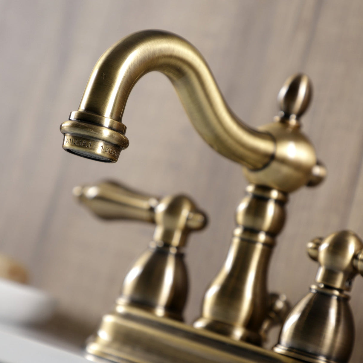 Heritage KB1603AL Two-Handle 3-Hole Deck Mount 4" Centerset Bathroom Faucet with Plastic Pop-Up, Antique Brass