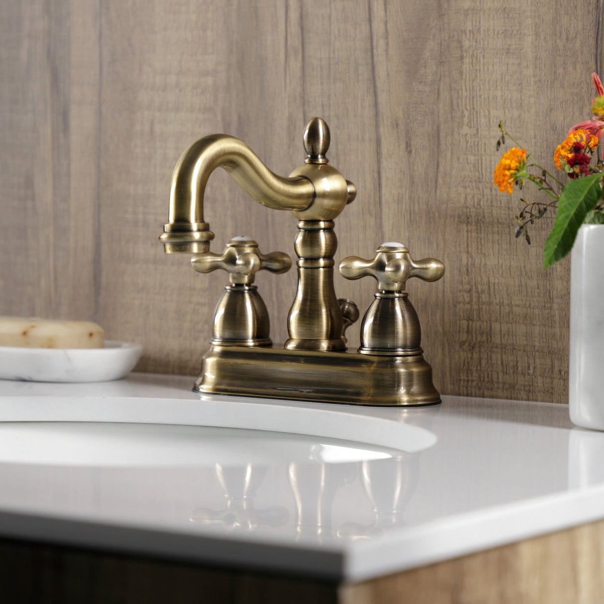 Heritage KB1603AX Two-Handle 3-Hole Deck Mount 4" Centerset Bathroom Faucet with Plastic Pop-Up, Antique Brass