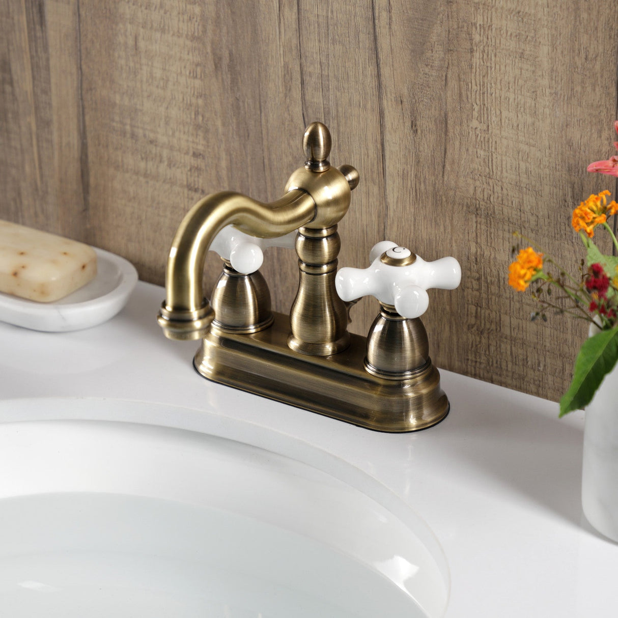 Heritage KB1603PX Two-Handle 3-Hole Deck Mount 4" Centerset Bathroom Faucet with Plastic Pop-Up, Antique Brass