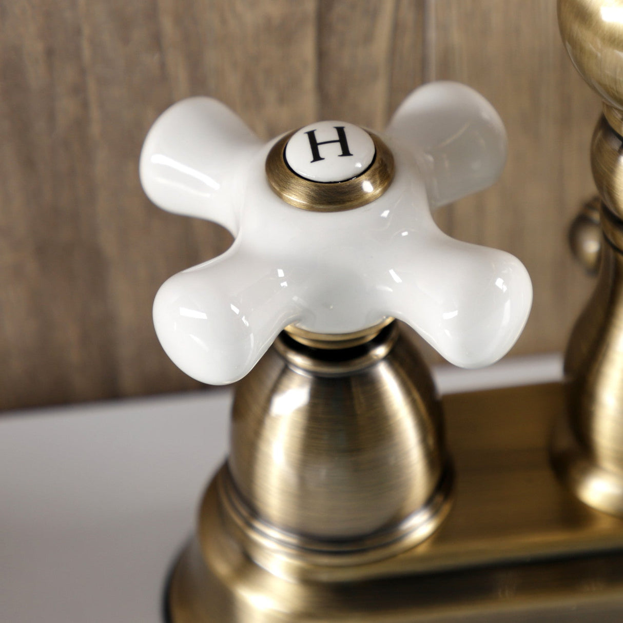 Heritage KB1603PX Two-Handle 3-Hole Deck Mount 4" Centerset Bathroom Faucet with Plastic Pop-Up, Antique Brass