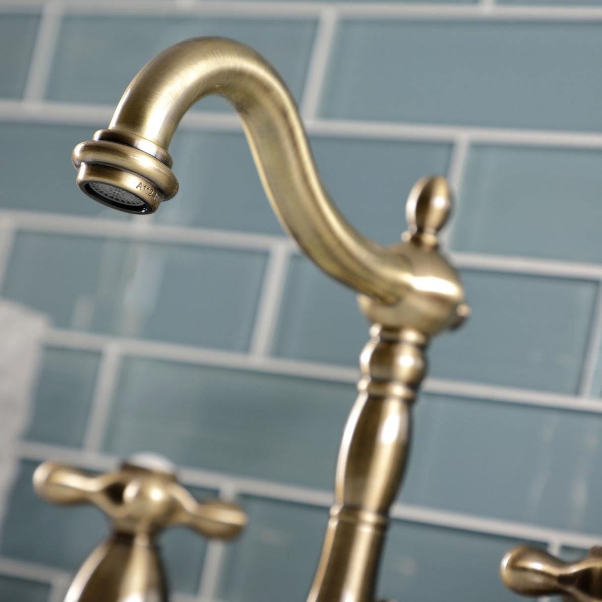 Heritage KB1973AX Two-Handle 3-Hole Deck Mount Widespread Bathroom Faucet with Brass Pop-Up, Antique Brass