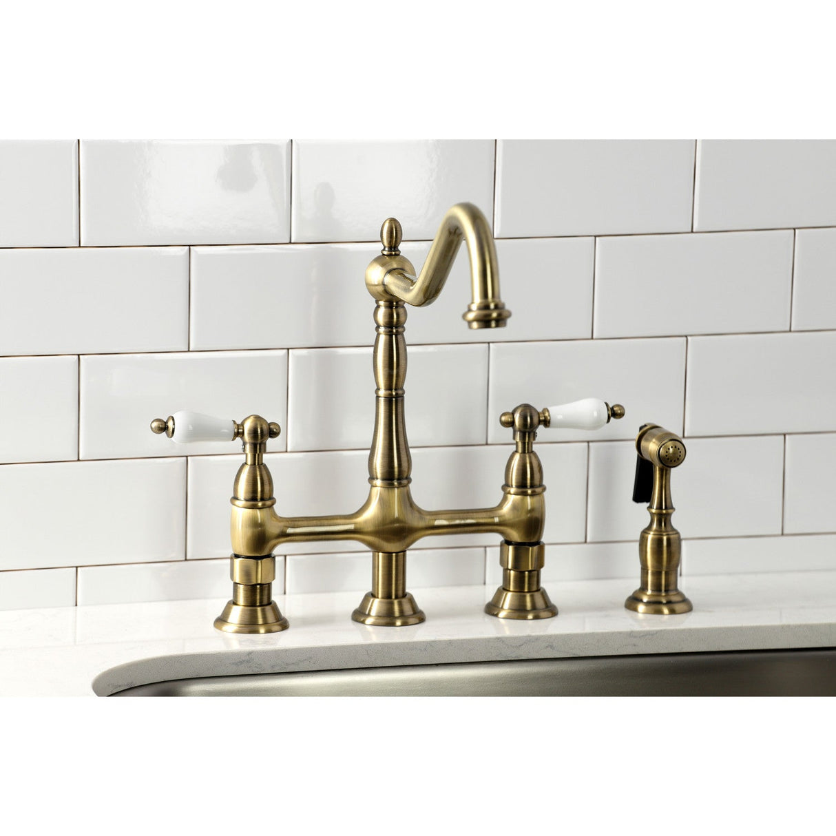Heritage KS1273PLBS Two-Handle 4-Hole Deck Mount Bridge Kitchen Faucet with Brass Sprayer, Antique Brass