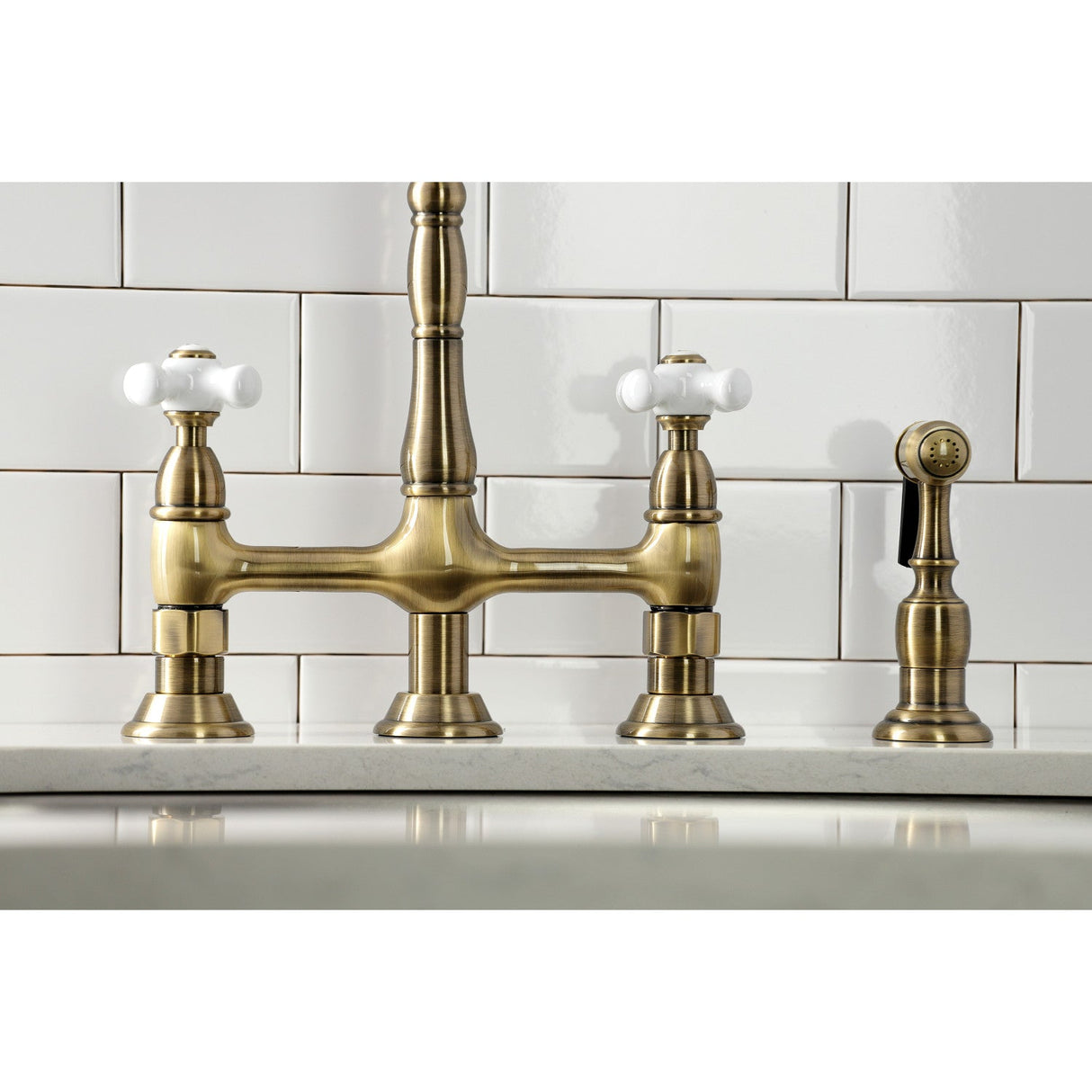 Heritage KS1273PXBS Two-Handle 4-Hole Deck Mount Bridge Kitchen Faucet with Brass Sprayer, Antique Brass