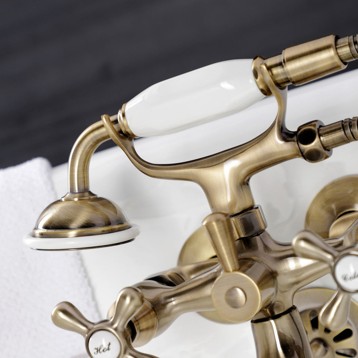 Kingston KS225AB Three-Handle 2-Hole Tub Wall Mount Clawfoot Tub Faucet with Handshower, Antique Brass