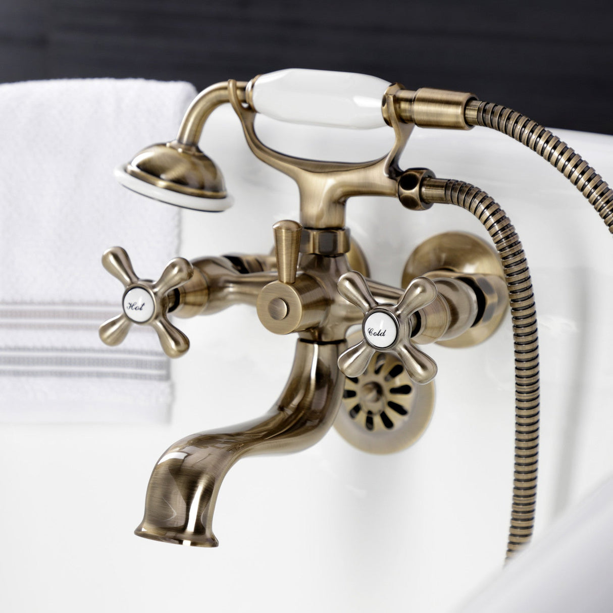 Kingston KS225AB Three-Handle 2-Hole Tub Wall Mount Clawfoot Tub Faucet with Handshower, Antique Brass
