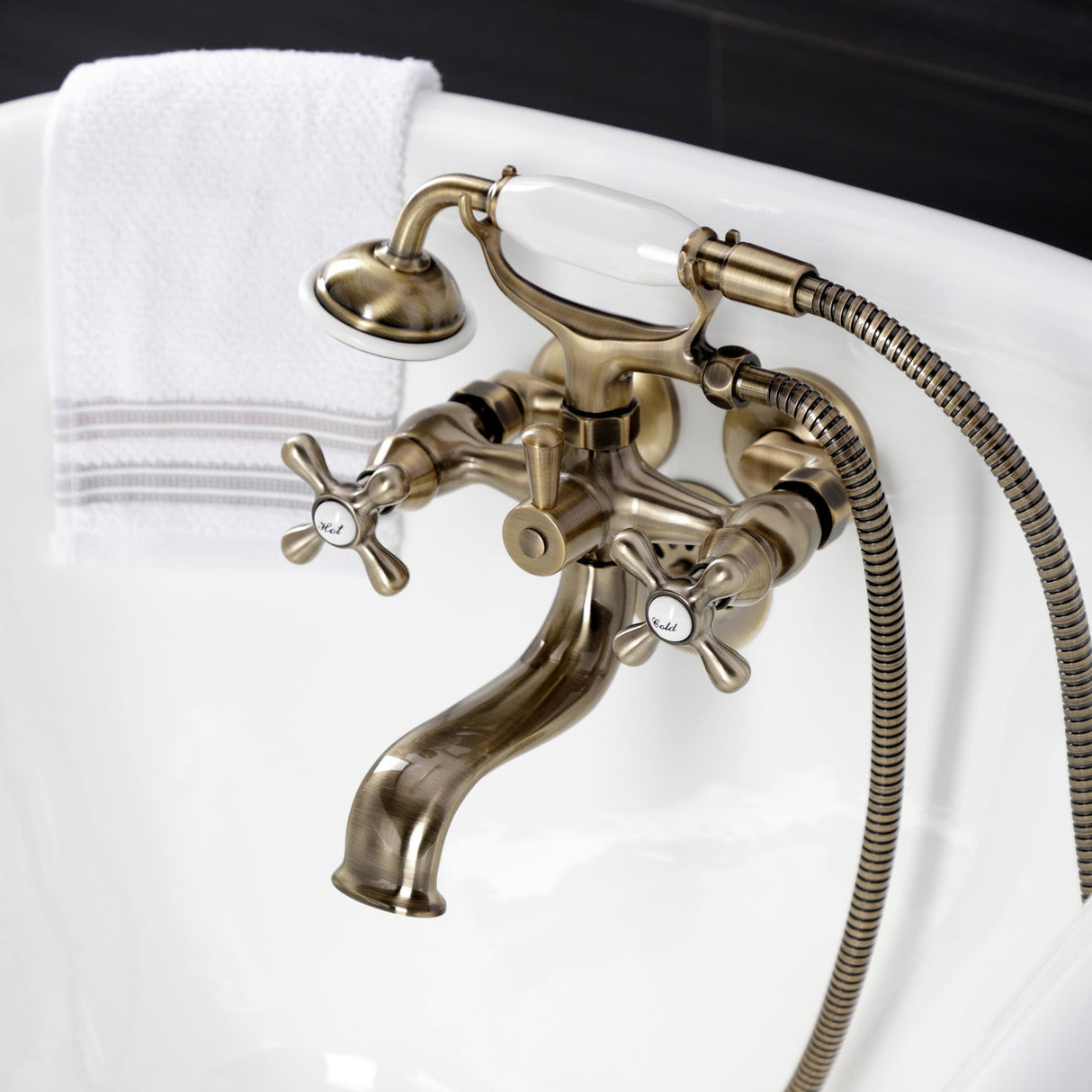 Kingston KS225AB Three-Handle 2-Hole Tub Wall Mount Clawfoot Tub Faucet with Handshower, Antique Brass