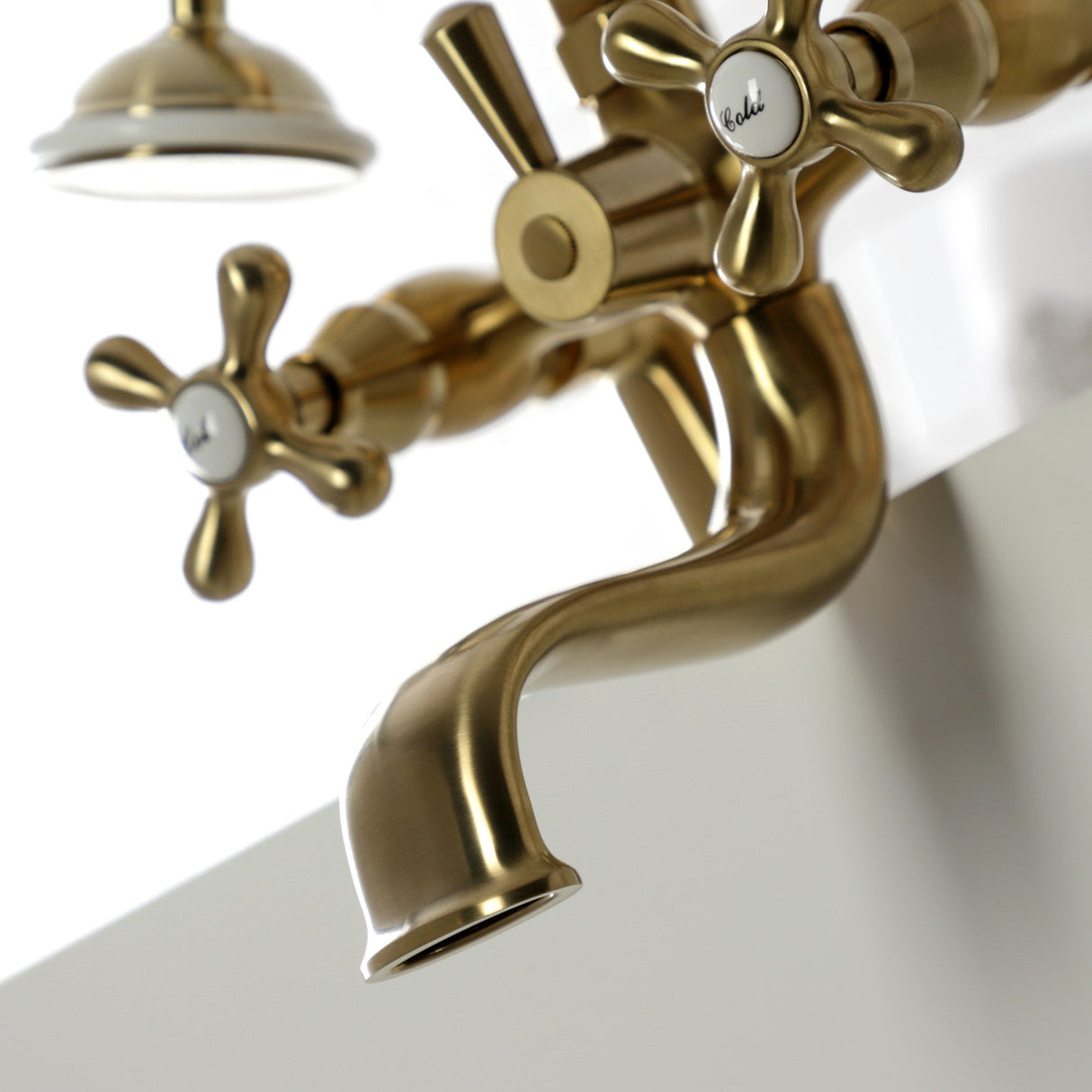 Kingston KS227SB Three-Handle 2-Hole Deck Mount Clawfoot Tub Faucet with Handshower, Brushed Brass