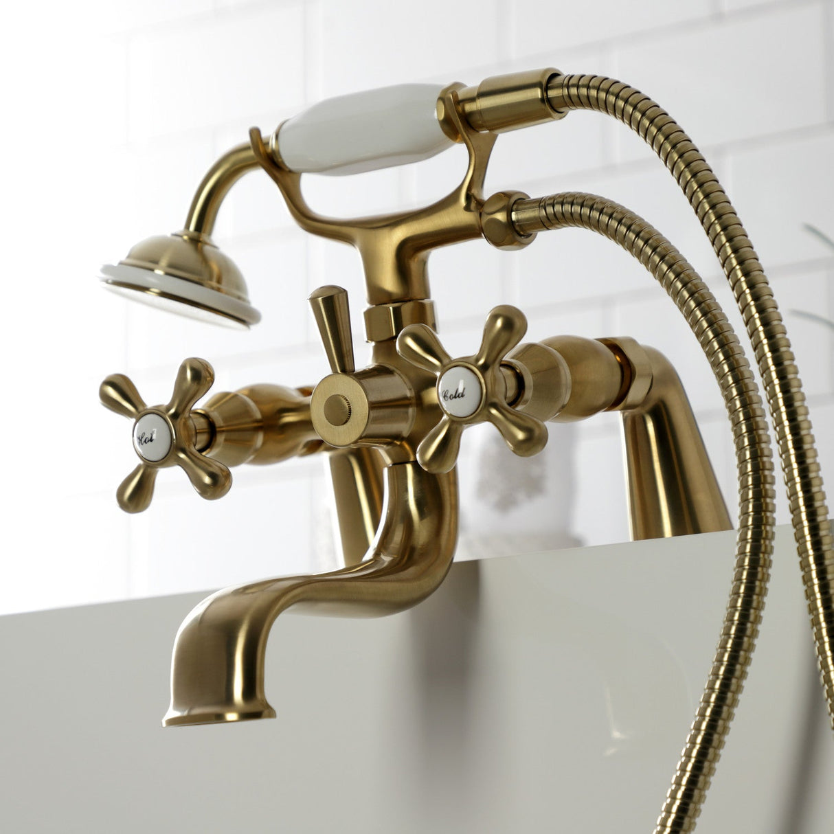 Kingston KS227SB Three-Handle 2-Hole Deck Mount Clawfoot Tub Faucet with Handshower, Brushed Brass