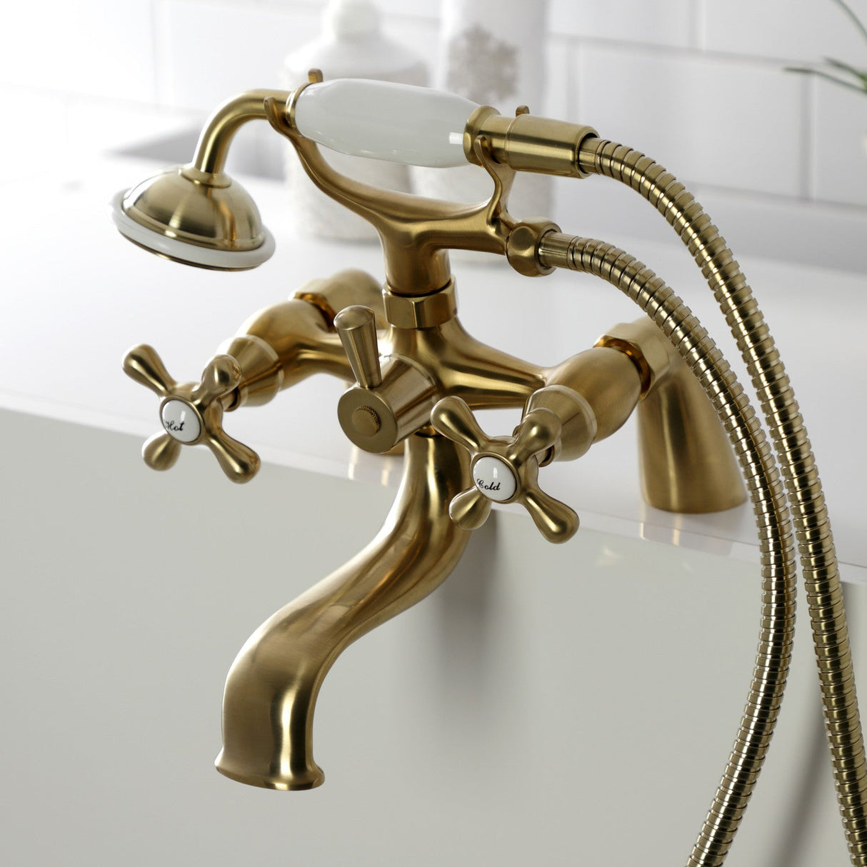 Kingston KS227SB Three-Handle 2-Hole Deck Mount Clawfoot Tub Faucet with Handshower, Brushed Brass
