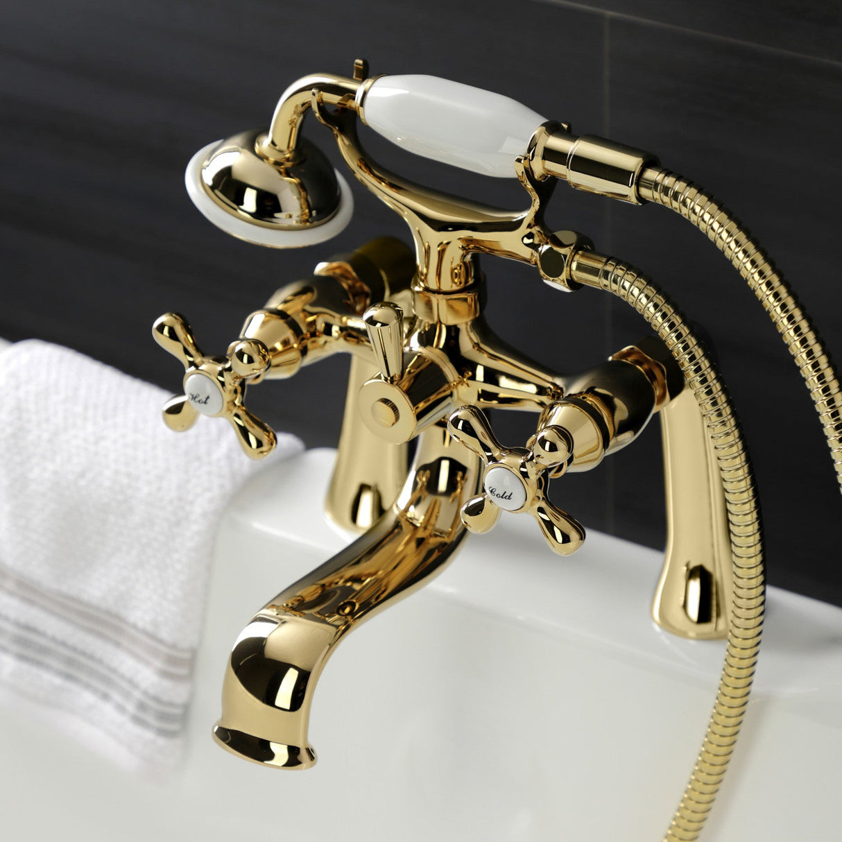 Kingston KS228PB Three-Handle 2-Hole Deck Mount Clawfoot Tub Faucet with Handshower, Polished Brass