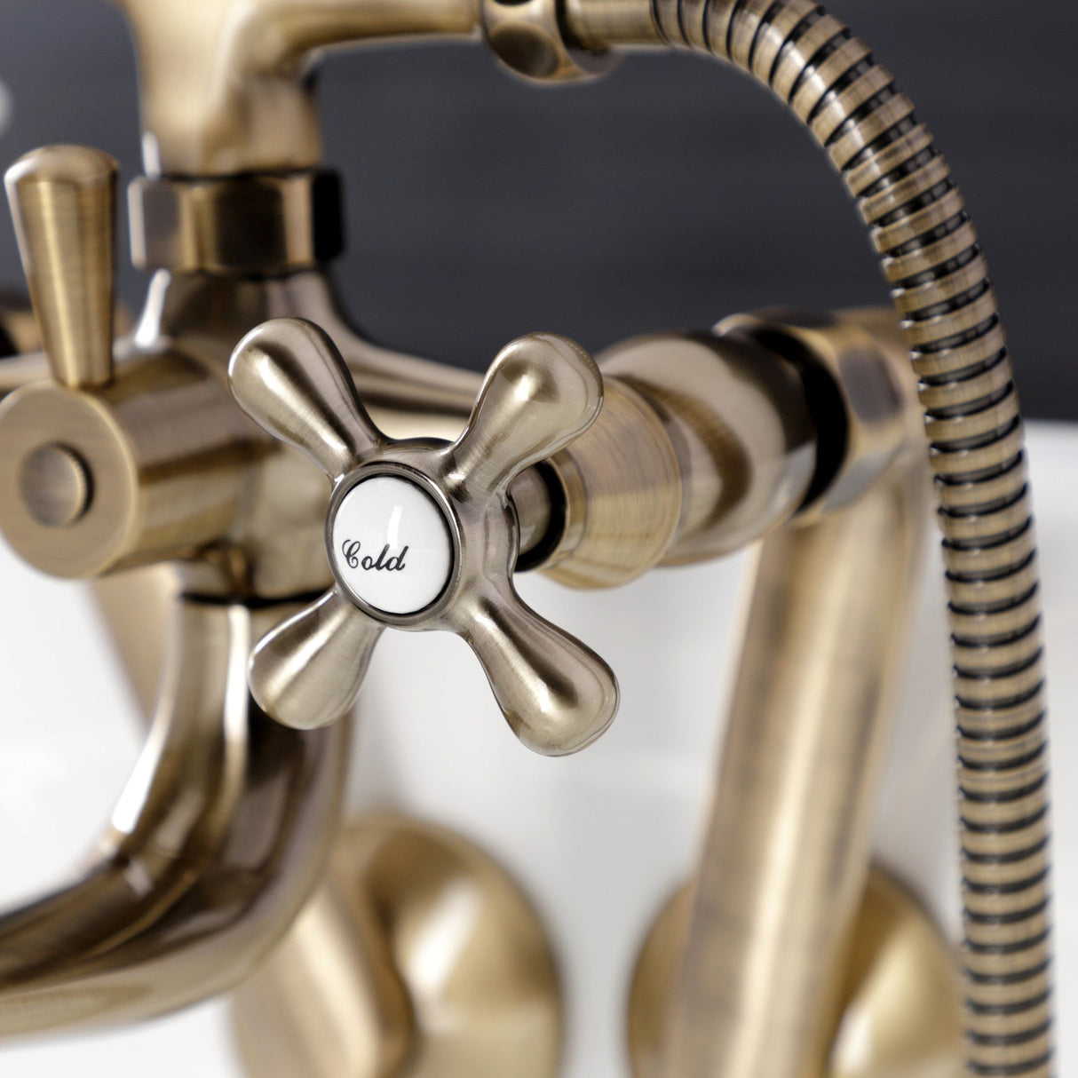 Kingston KS229AB Three-Handle 2-Hole Tub Wall Mount Clawfoot Tub Faucet with Handshower, Antique Brass