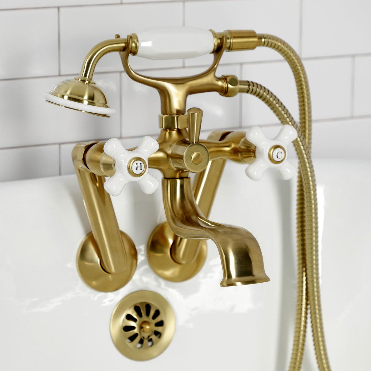 Kingston KS229PXSB Three-Handle 2-Hole Tub Wall Mount Clawfoot Tub Faucet with Hand Shower, Brushed Brass