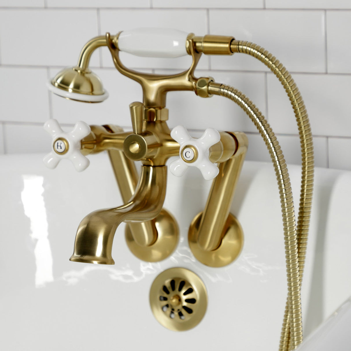 Kingston KS229PXSB Three-Handle 2-Hole Tub Wall Mount Clawfoot Tub Faucet with Hand Shower, Brushed Brass