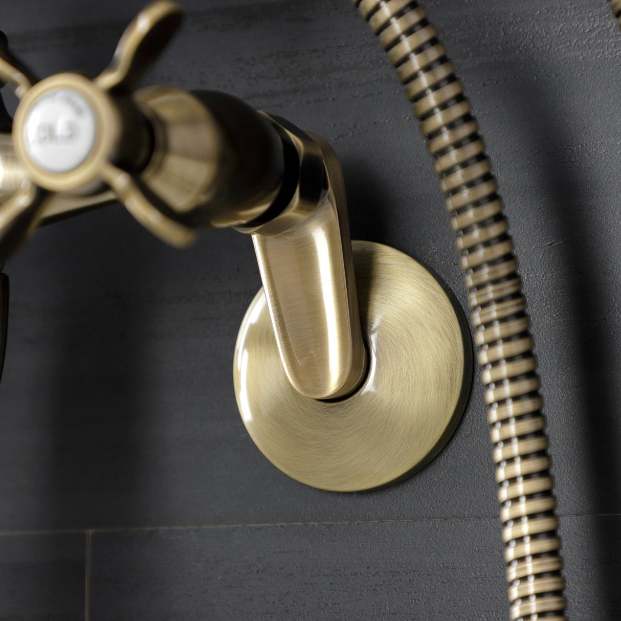 Essex KS246AB Three-Handle 2-Hole Wall Mount Clawfoot Tub Faucet with Handshower, Antique Brass