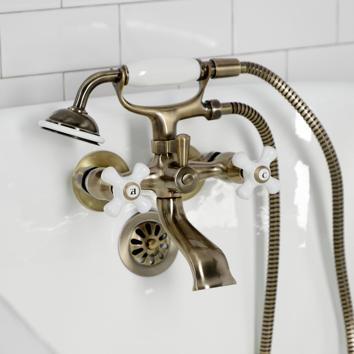 Kingston KS265PXAB Three-Handle 2-Hole Tub Wall Mount Clawfoot Tub Faucet with Hand Shower, Antique Brass