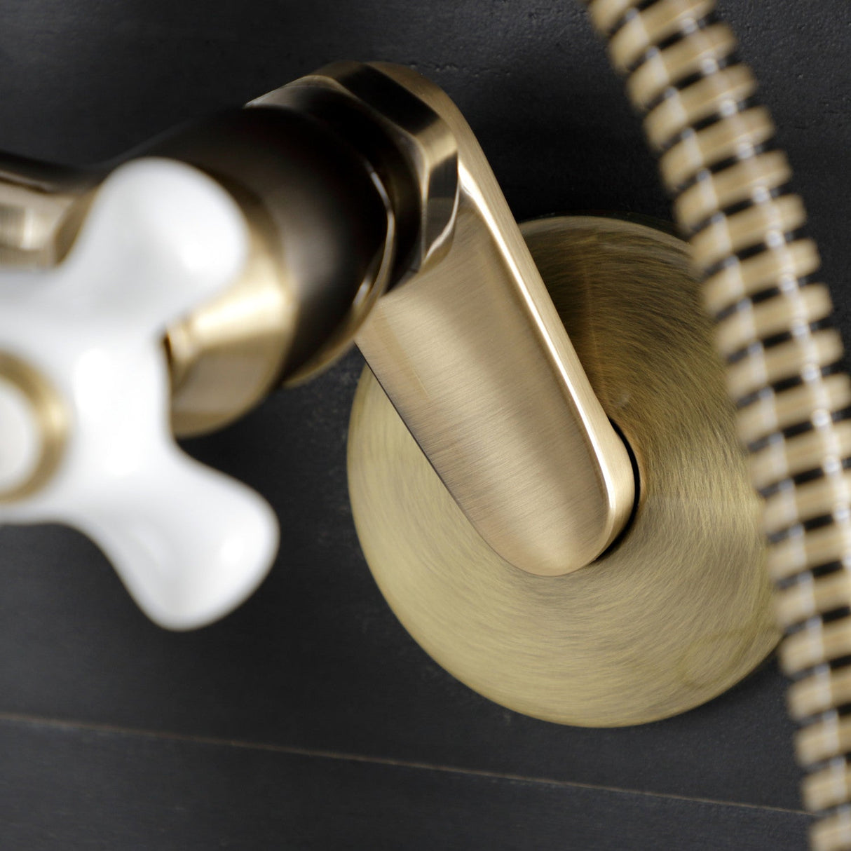 Kingston KS266PXAB Three-Handle 2-Hole Wall Mount Clawfoot Tub Faucet with Hand Shower, Antique Brass