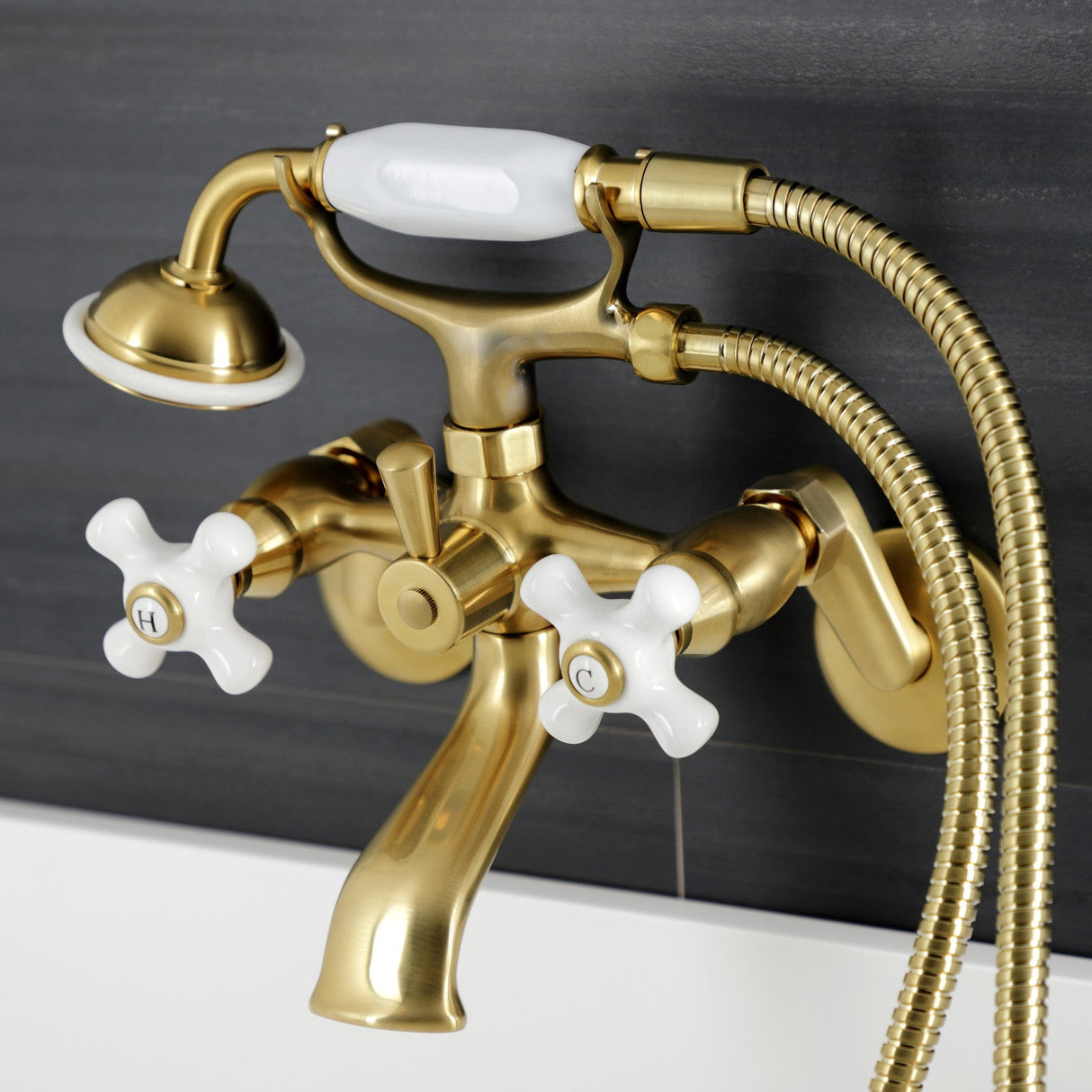 Kingston KS266PXSB Three-Handle 2-Hole Wall Mount Clawfoot Tub Faucet with Hand Shower, Brushed Brass