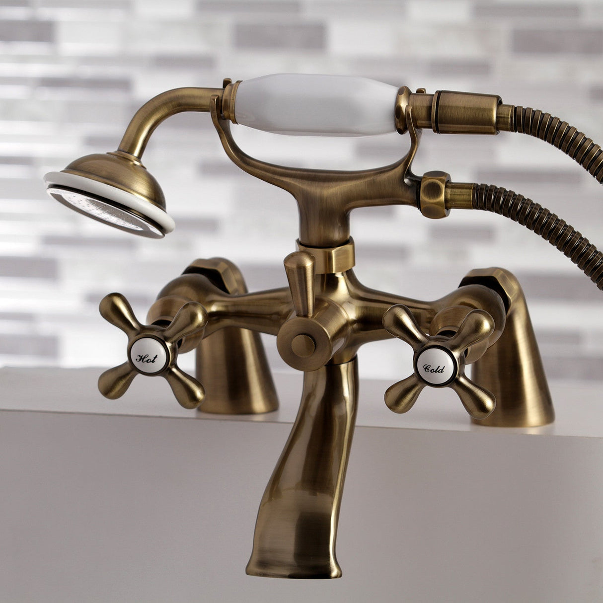 Kingston KS267AB Three-Handle 2-Hole Deck Mount Clawfoot Tub Faucet with Hand Shower, Antique Brass