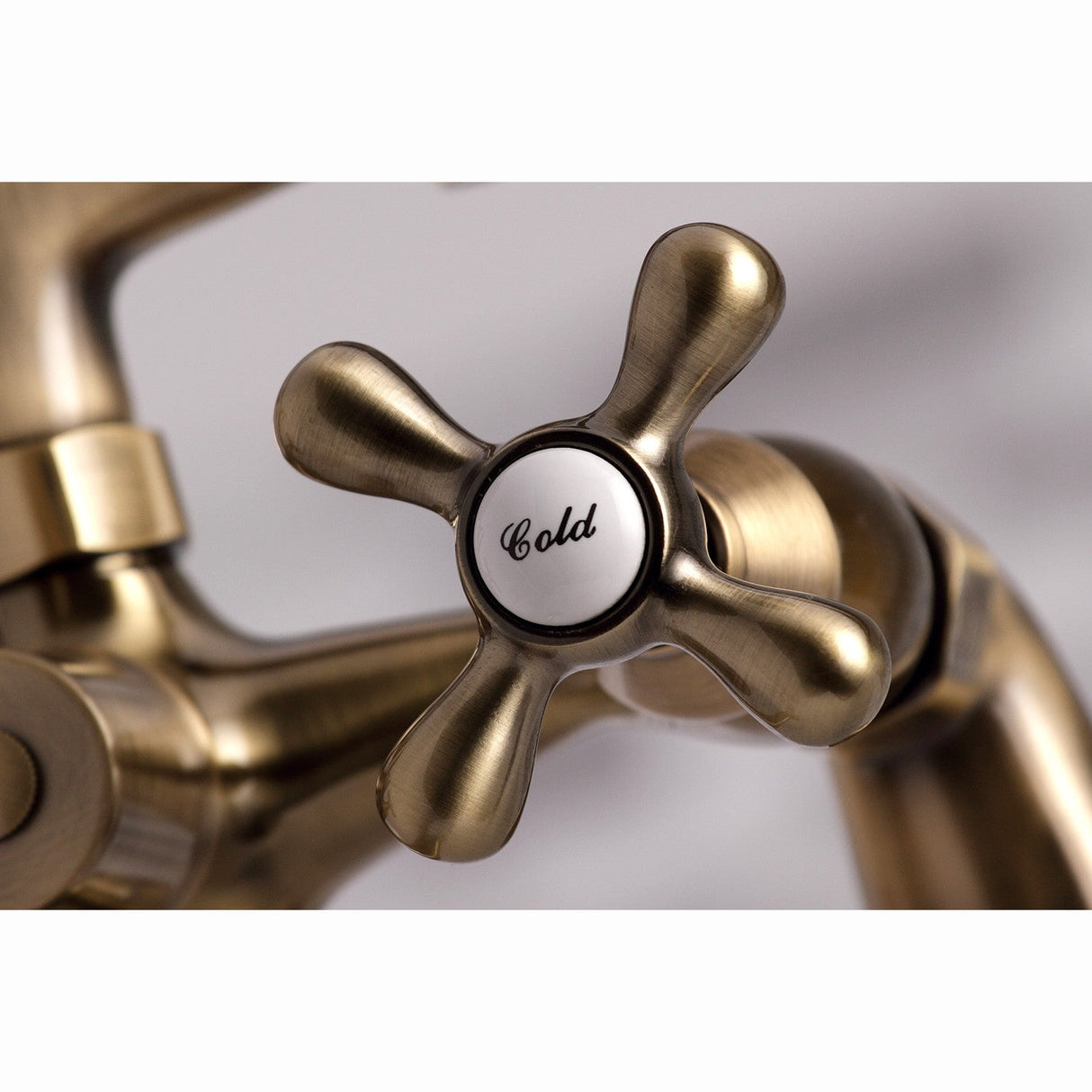 Kingston KS267AB Three-Handle 2-Hole Deck Mount Clawfoot Tub Faucet with Hand Shower, Antique Brass