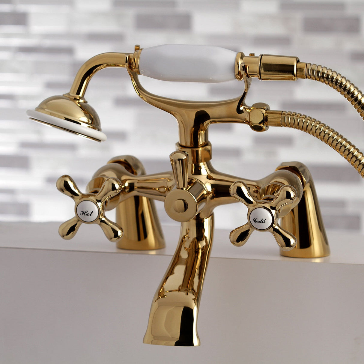 Kingston KS267PB Three-Handle 2-Hole Deck Mount Clawfoot Tub Faucet with Hand Shower, Polished Brass