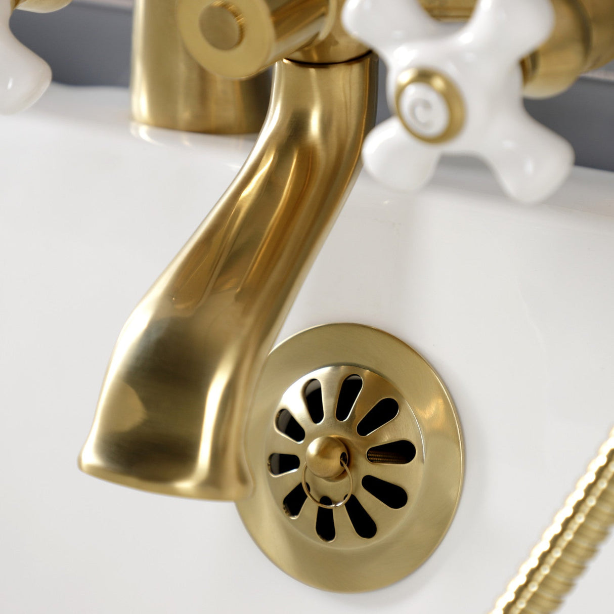 Kingston KS267PXSB Three-Handle 2-Hole Deck Mount Clawfoot Tub Faucet with Hand Shower, Brushed Brass