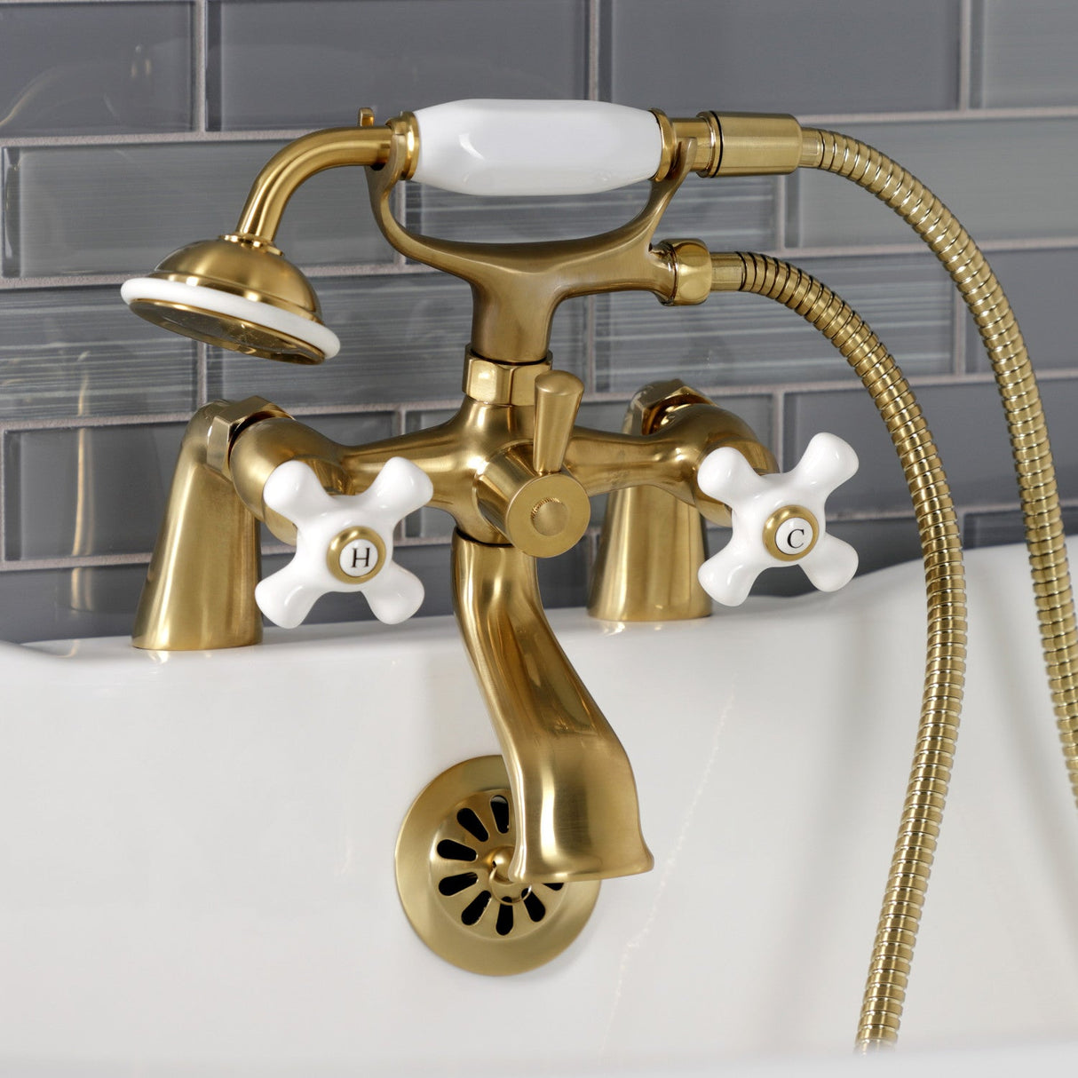 Kingston KS267PXSB Three-Handle 2-Hole Deck Mount Clawfoot Tub Faucet with Hand Shower, Brushed Brass