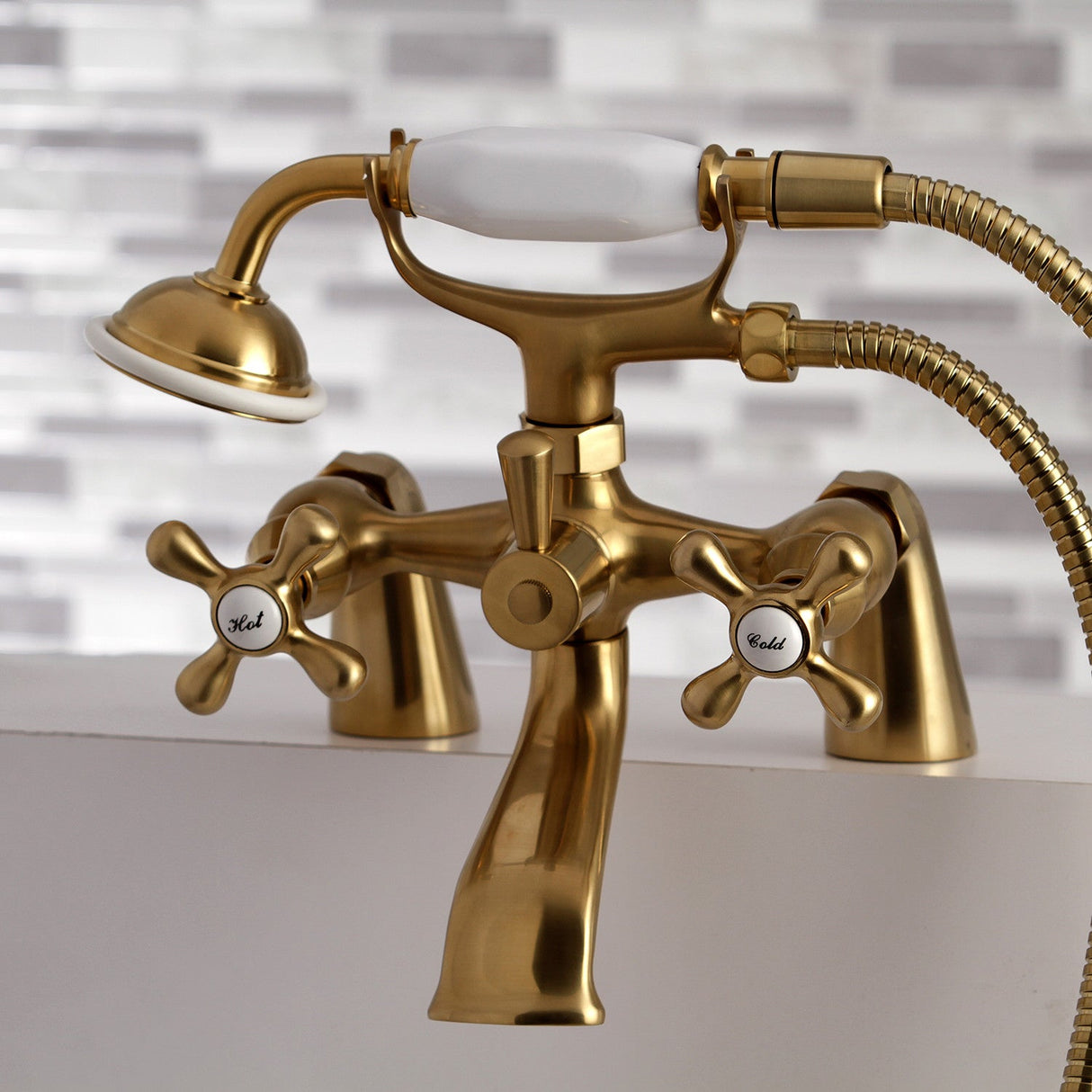 Kingston KS267SB Three-Handle 2-Hole Deck Mount Clawfoot Tub Faucet with Hand Shower, Brushed Brass