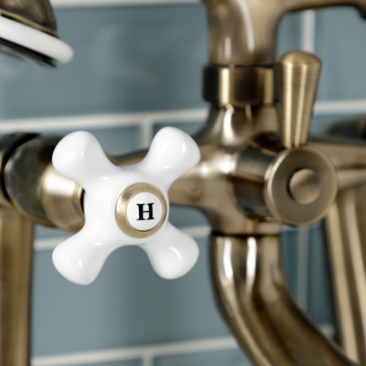 Kingston KS268PXAB Three-Handle 2-Hole Deck Mount Clawfoot Tub Faucet with Hand Shower, Antique Brass