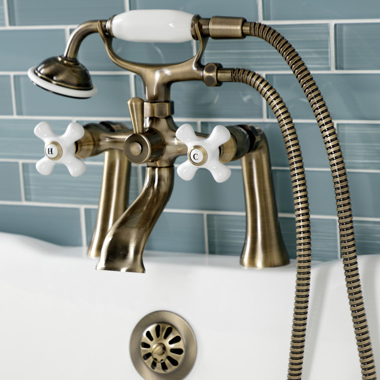 Kingston KS268PXAB Three-Handle 2-Hole Deck Mount Clawfoot Tub Faucet with Hand Shower, Antique Brass