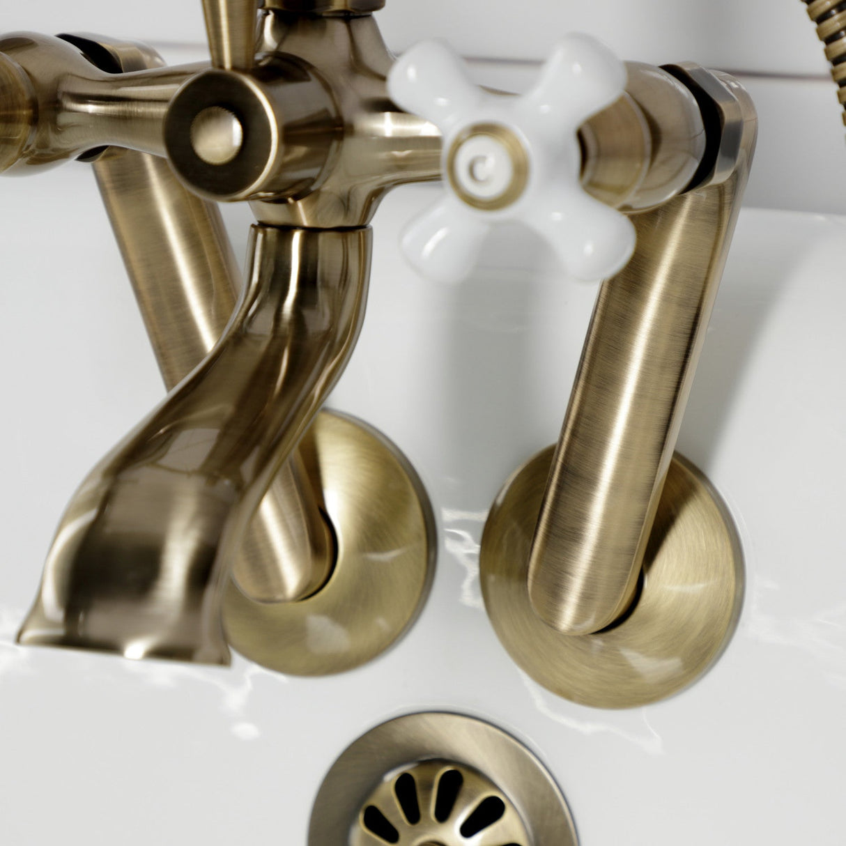 Kingston KS269PXAB Three-Handle 2-Hole Tub Wall Mount Clawfoot Tub Faucet with Hand Shower, Antique Brass