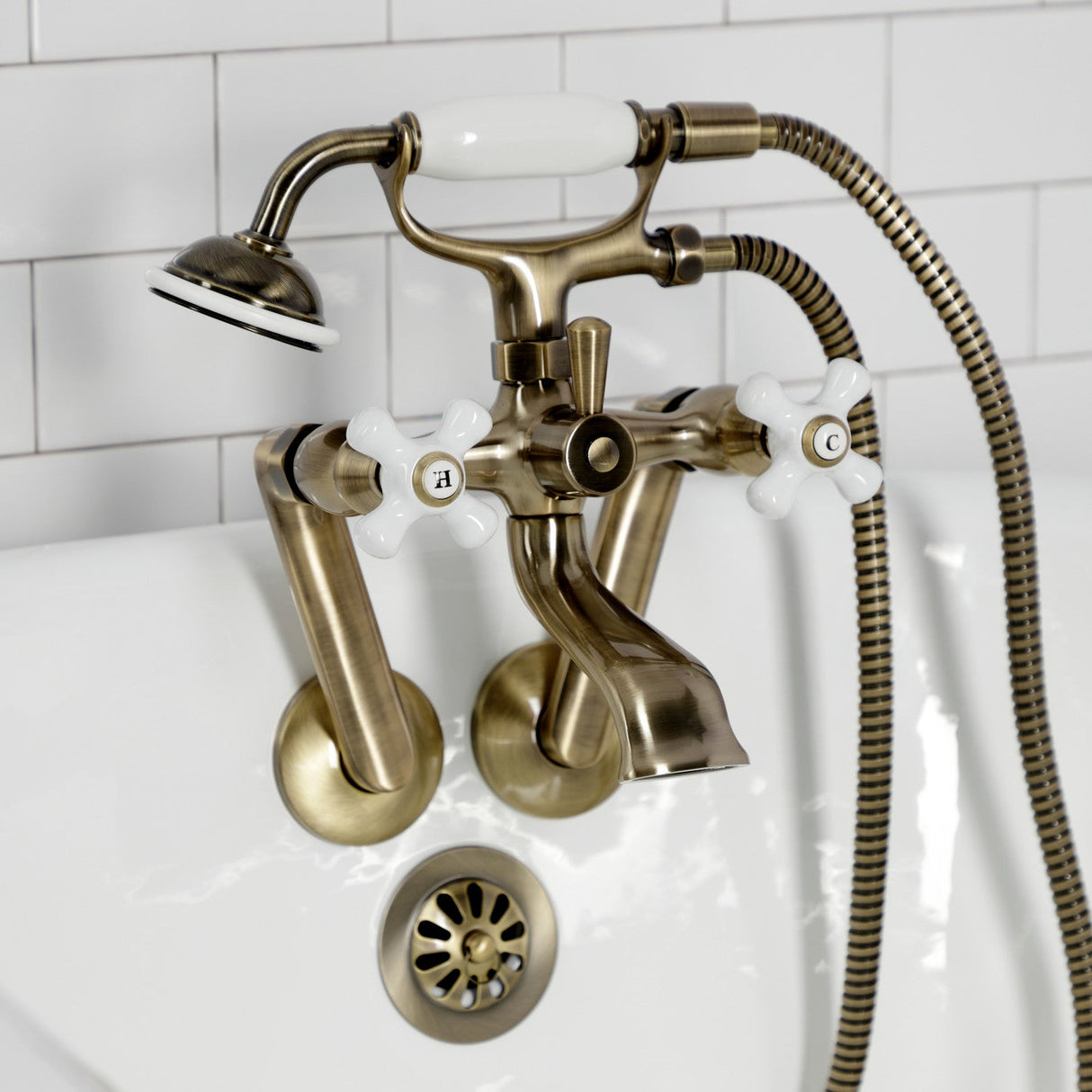 Kingston KS269PXAB Three-Handle 2-Hole Tub Wall Mount Clawfoot Tub Faucet with Hand Shower, Antique Brass