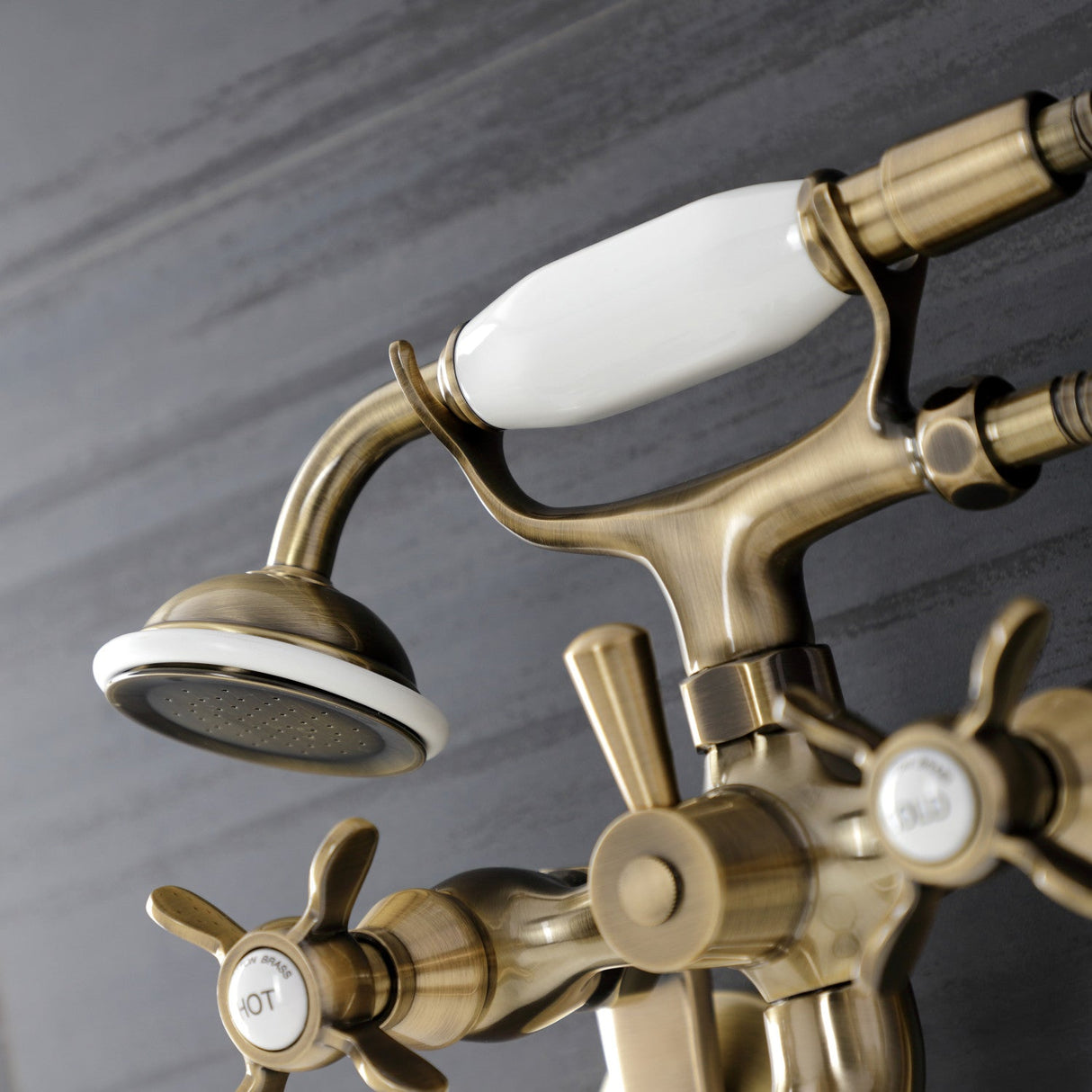 Essex KS286AB Three-Handle 2-Hole Wall Mount Clawfoot Tub Faucet with Hand Shower, Antique Brass