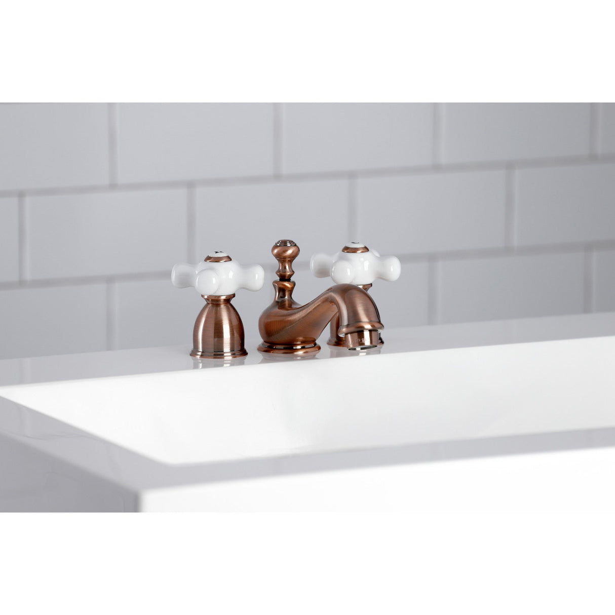 Restoration KS395PXAC Two-Handle 3-Hole Deck Mount Mini-Widespread Bathroom Faucet with Brass Pop-Up, Antique Copper