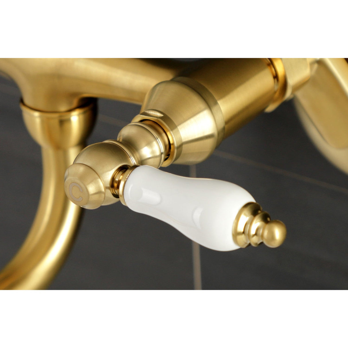 Kingston KS516SB Two-Handle 2-Hole Wall Mount Bathroom Faucet, Brushed Brass