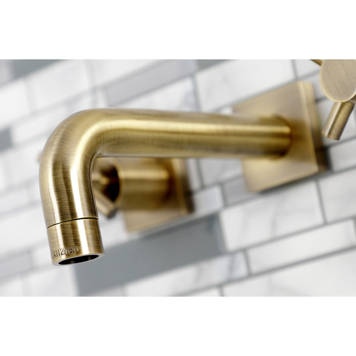 Concord KS6123DX Two-Handle 3-Hole Wall Mount Bathroom Faucet, Antique Brass
