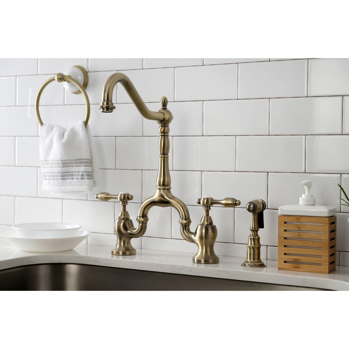 Tudor KS7753TALBS Two-Handle 3-Hole Deck Mount Bridge Kitchen Faucet with Brass Sprayer, Antique Brass