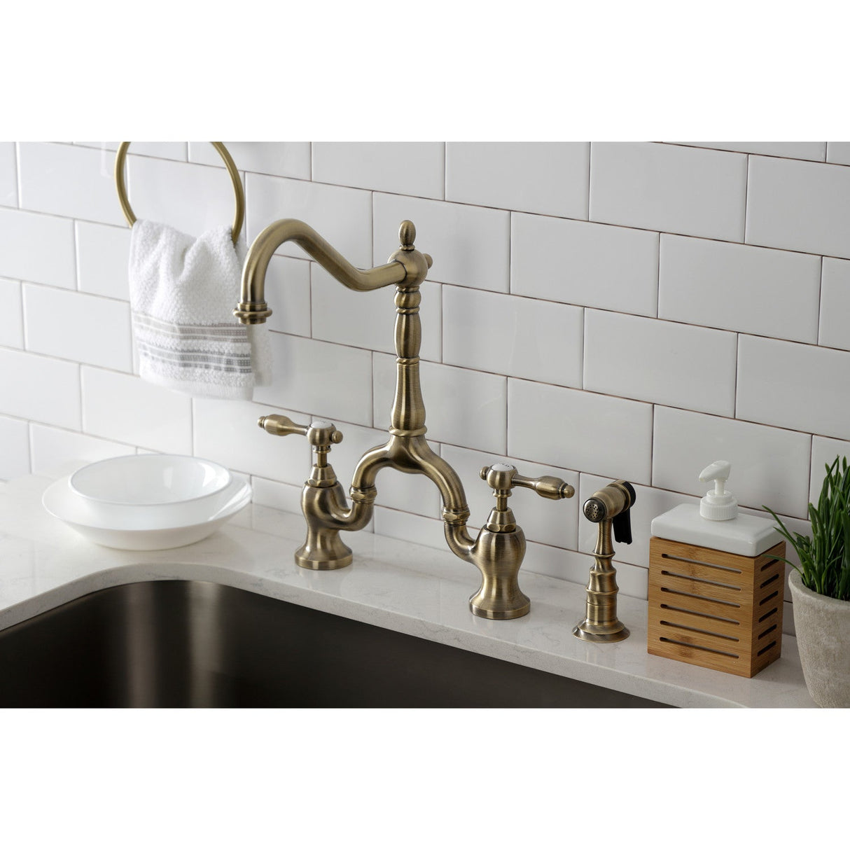 Tudor KS7753TALBS Two-Handle 3-Hole Deck Mount Bridge Kitchen Faucet with Brass Sprayer, Antique Brass
