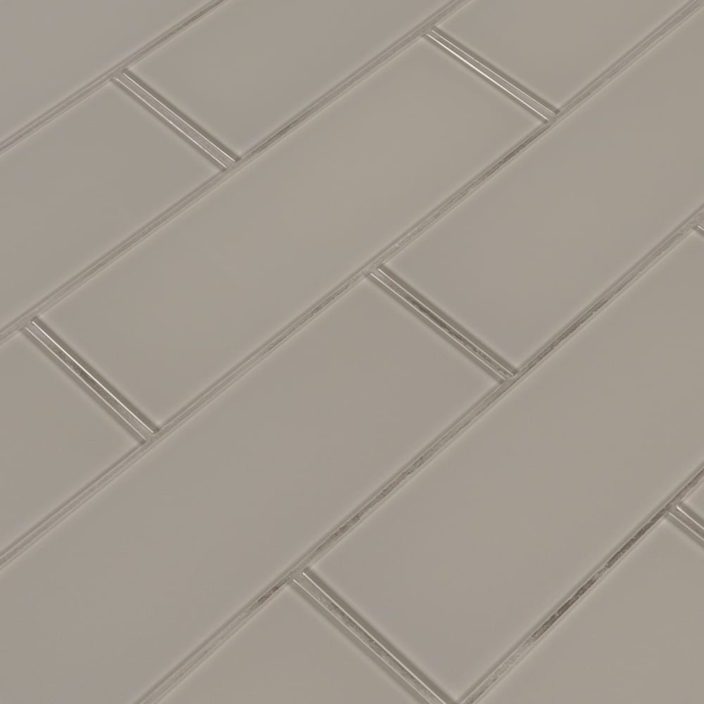 Pebble 3x9 glossy glass gray subway tile SMOT GL T PEB39 product shot angle view #Size_3"x9"