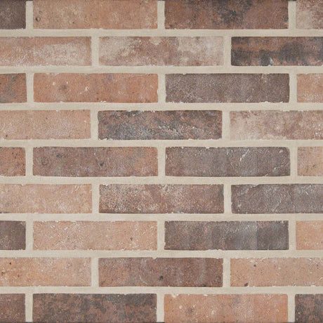 MSI brick collection capella red brick NCAPREDBRI2X10 glazed porcelain floor wall tile product shot multiple brick angle view#Size_2-1/3"x10"