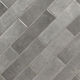Renzo storm 3x12 glossy ceramic gray wall tile NRENSTO3X12 product shot multiple tiles angle view #Size_3"x12"