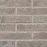 MSI brick collection capella taupe brick NCAPTAUBRI2X10 glazed porcelain floor wall tile product shot multiple bricks top view #Size_2-1/3"x10"
