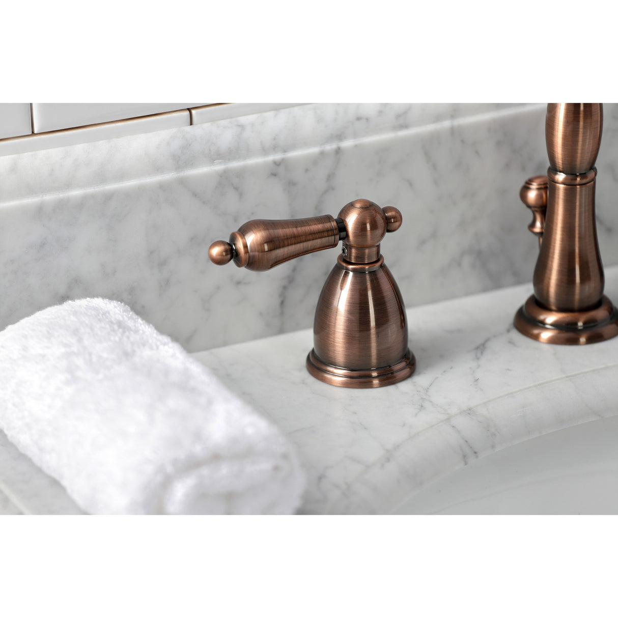 Kingston Brass KB197ALAC Heritage Widespread Bathroom Faucet with Brass Pop-Up, Antique Copper